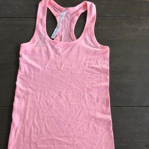 Bright pink Lululemon tank